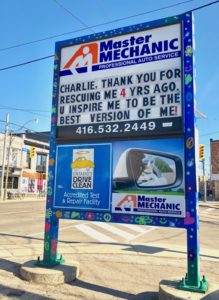 Josie Candito's Master Mechanic sign is used to share positive messages. 