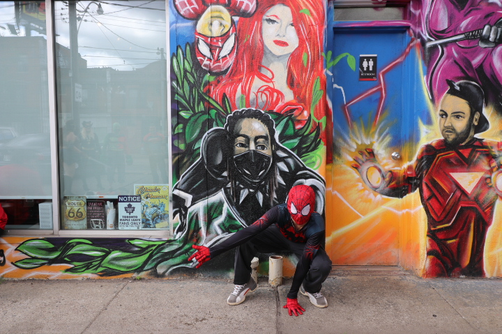 Spidey poses in front of Master Mechanic High Park before doing the #inmyfeelings challenge.